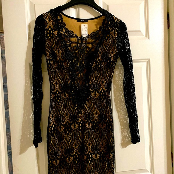 Mini, lacy, black dress - Picture 1 of 4